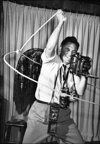 Strobe shot of Joseph Janney Steinmetz "taking a photo the hard way": Sarasota, Florida (1947)