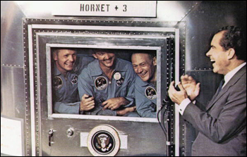 Apollo 11 Astronauts (left to right) Neil Armstrong, Michael Collins and Edwin "Buzz" Aldrin greeted by President Richard Nixon upon their return from space: Aboard the U.S. S. Hornet in the Pacific Ocean (July 24, 1969)