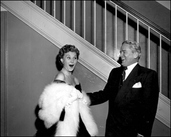 Mari Aldon makes Governor Warren laugh at the celebration for "Distant Drums" premiere: Saint Augustine, Florida (1951)