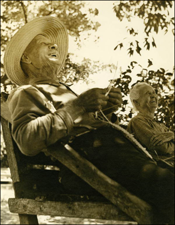 William Keye and Mary Jane Roberts making straw hats: Riviera Beach, Florida (1939)
