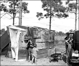 Migrant family at their shelter: Winter Haven, Florida (1937)
