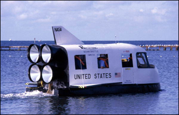 First annual Key West Raft Race participants leaving Monroe Beach : Key West, Florida (1986)