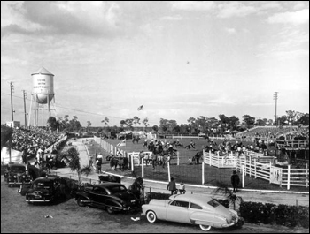 Grand entry of cowboys and cowgirls: Lakeland, Florida (1950)