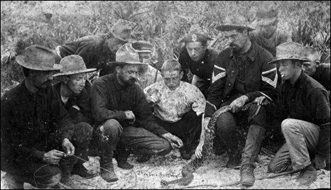 2nd Virginia Volunteers playing with a rattlesnake: Pablo Beach, Florida (1898)