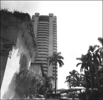 Skyscraper next to Spanish architecture: Boca Raton, Florida (19--)