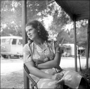 Roey Stickles sits out on the porch in the trailer park: Sarasota, Florida (1946)
