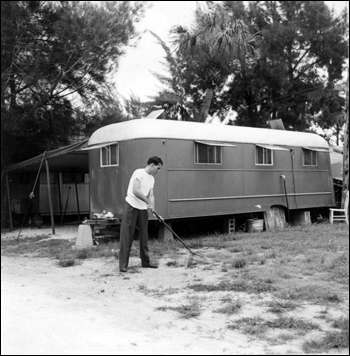 Al Stickles tends to the area near his trailer: Sarasota, Florida (1946) 