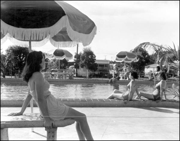 Residents by the pool: Miami, Florida (1953)