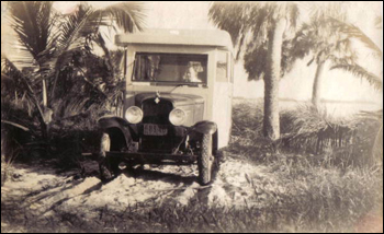 William Frost Layton in recreational vehicle on tract of land he later developed into Layton's Cottage, Trailer, and Fishing Park: Riviera Beach, Florida (ca. 1940) 