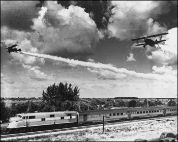 Planes flying over new streamliner (1939)