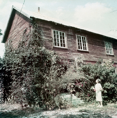 Hedwig Michel outside Cyrus Teed’s Estero home at Koreshan State Historic Park<