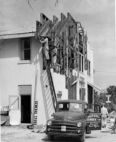 Koreshan Unity building with office, general store and Riverview Inn restaurant undergoing alterations, ca. 1950s