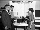 High school seniors gathered around exhibit at the Big Bend Science Fair in Tallahassee (1960)