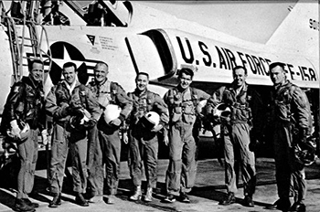 Original seven Project Mercury astronauts with U.S. Air Force F-106B jet aircraft (between 1959 and 1963)