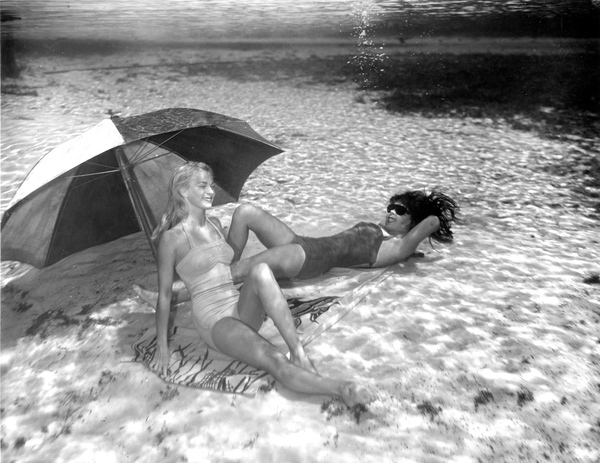 Ginger Stanley and Merle Ivey posing underwater at Weeki Wachee Springs