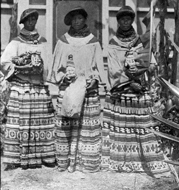 Mikasuki sisters with their crafts outside the mission