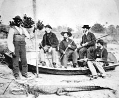 Stereoview of alligator hunting party