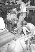 Diver and crew working on set of "Revenge of the Creature" movie.