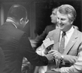 Florida Legislator Bobby Brantley receiving a miniature United States flag