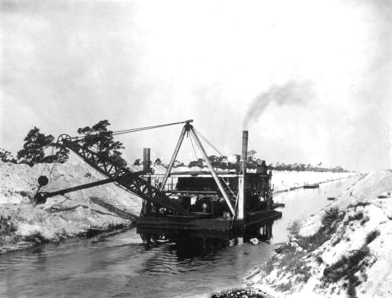 Steam shovel dredging a canal for the Everglades drainage project (circa 1910s).