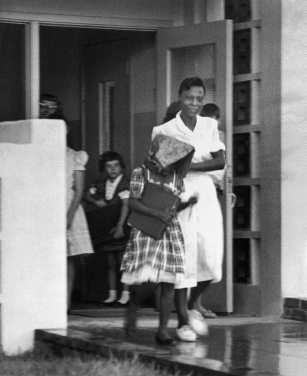 Mrs. Pearson picks up her youngest daughter from the newly integrated Fulford Elementary School in Miami, September 6, 1960. in 1959, Dade County became the first Florida school district to integrate black and whites students. Other districts, such as Duval, opposed such action until the late 1960s.