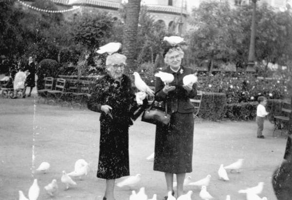 Marjory Stoneman Douglas and Mae Knight Clark with pigeons in Europe
