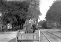At the railroad depot waiting for the mail
