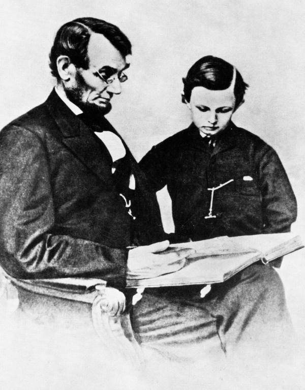 President Lincoln, with his son Tad.