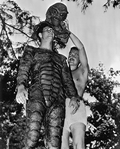 Ricou Browning is helped with his movie costume.