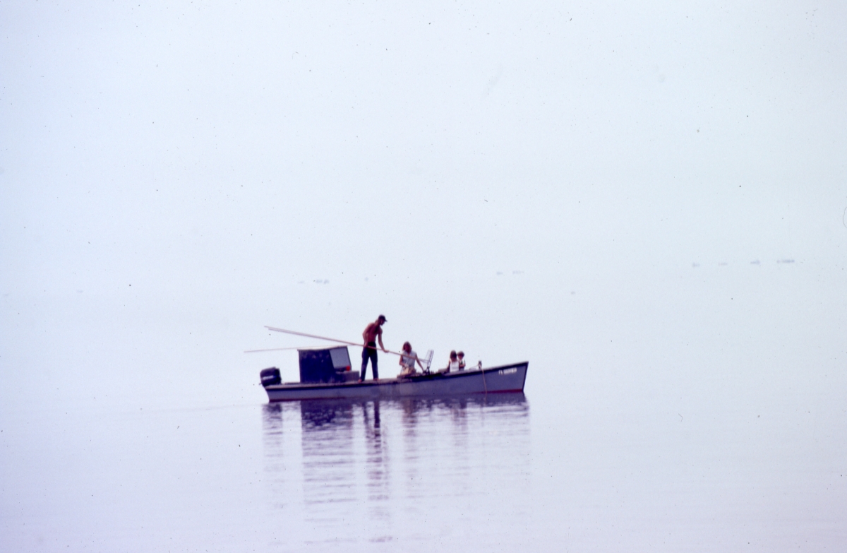 People harvesting oysters - Apalachicola Bay, Florida.