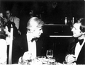 Actor Lloyd Bridges, left, at dinner with an unidentified man - Fort Lauderdale, Florida.