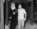 Actor Mickey Rooney standing with an unidentified woman - Fort Lauderdale, Florida.