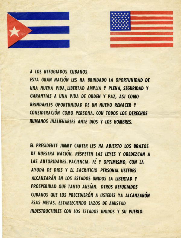 Flier circulated on behalf of President Jimmy Carter to Cuban refugees arriving in the United States during the Mariel Boatlift. Translation: 