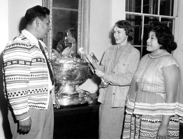 Florida first lady Mrs. LeRoy Collins talking with Seminoles at "The Grove" - Tallahassee, Florida.