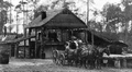 Southern Turpentine Still workers on a horse-drawn wagon