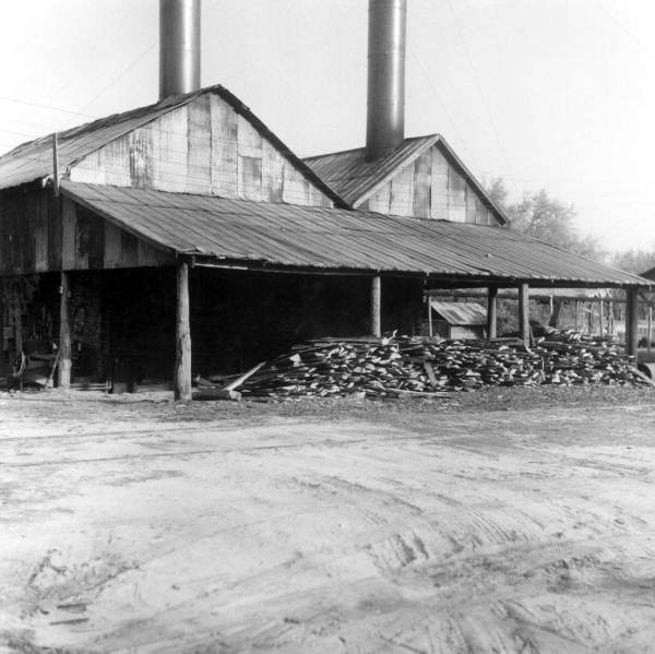 Exterior view of Boynton's still for naval stores, near Tallahassee