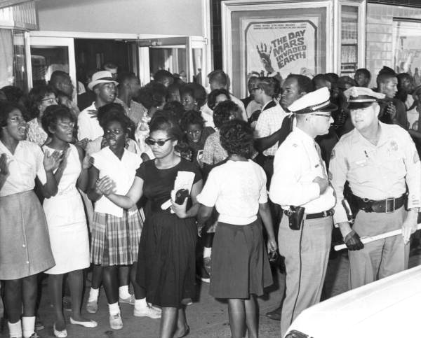 Patricia Stephens at civil rights demonstration in front of a segregated theater, Tallahassee, 1963