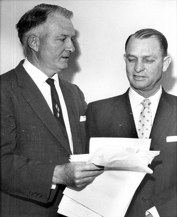 Atty. Gen. Richard Ervin (left), with Rep. Ben Hill Griffin of Polk County (right). Griffin was chairman of a committee devising legislation allowing parents to withdraw their children from integrated schools  (1959). State Archives of Florida, Florida Memory