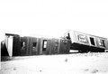 Bagdad Land & Lumber Company camp cars upended after the 1916 hurricane
