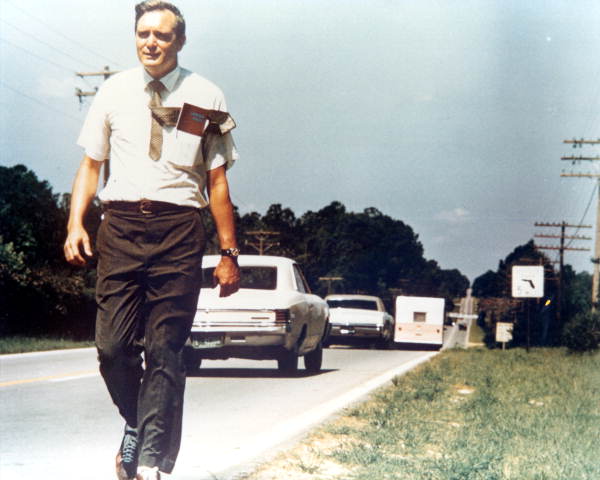 Then-State Senator Lawton Mainor Chiles, Jr. walks along a Florida highway during his campaign for the U.S. Senate (1970).