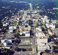 Aerial view looking north down Monroe St. over the Capitol in Tallahassee, Florida.