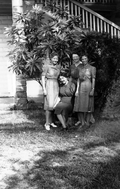 Midwife instructor Jule Graves, seated, with some women.