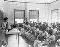 Jule Graves showing a class of midwives the contents of a model midwife bag at Florida A&M College in Tallahassee, Florida.