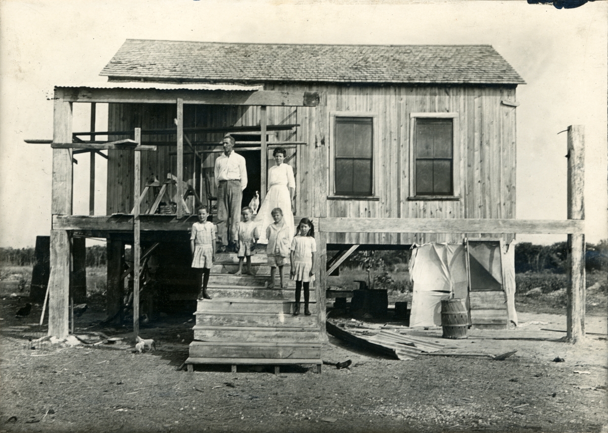 John Douthet family in front of residence, April 1917