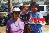 3 generations of Seminoles at the Brighton Reservation tribal festival.
