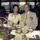 Mrs. Frank McMahon dining with Dr. Aldo Gucci at the Palm Beach Polo and Country Club.