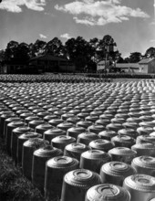 Pine top turpentine still and outdoor storage yard - Florida