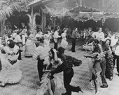 Conga line dancing at a carnival in Key West.