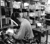 A worker heli-arc welding at the Visioneering Company - Sarasota, Florida