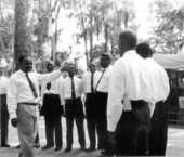 Alfonso Levy leading the Amigo Male Singers at the Florida Folk Festival - White Springs, Florida